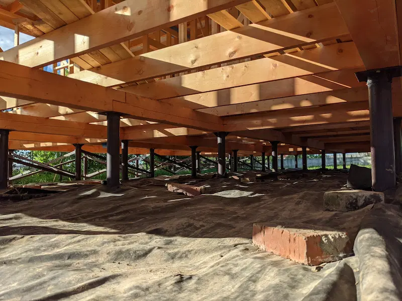 Steel helical pile foundation for a home